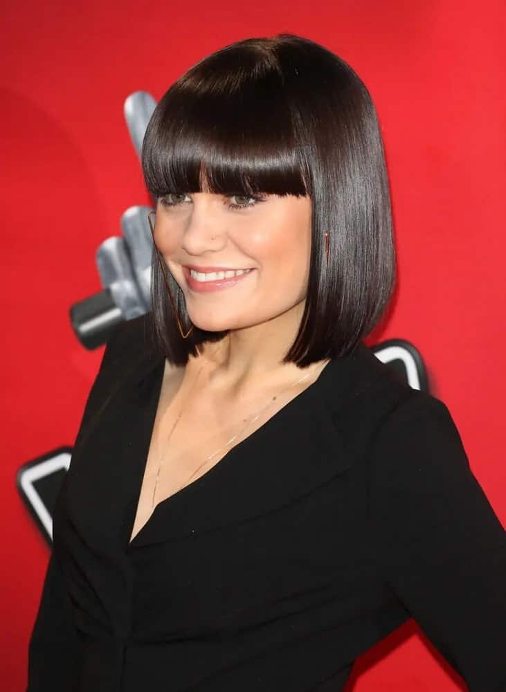 Jessie J went with this iconic look of straight raven bob with bangs paired with her black outfit last November 3, 2013 during the BBC's The Voice UK Launch Photocall.