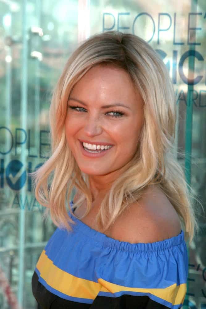 Malin Akerman was at the "People's Choice Awards" 2011 Nominations Announcement in West Hollywood with her sunshine smile that is complemented by her blond layered and tousled waves on her shoulders.