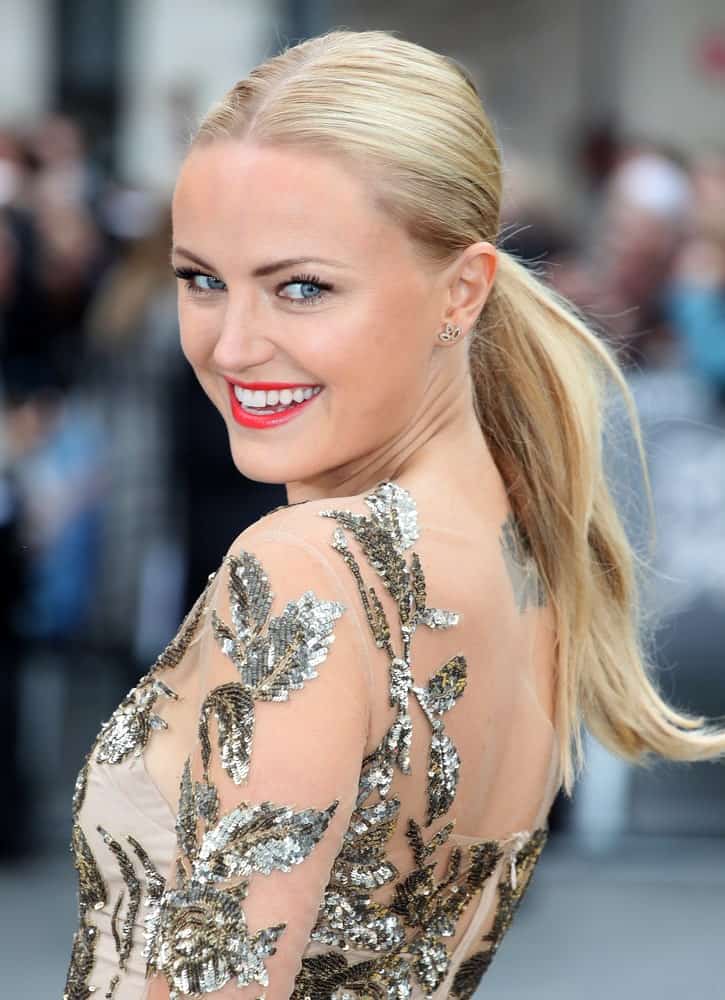 Malin Akerman was sporting a simple low ponytail with subtle brown highlights to complement her sequined dress for the Rock Of Ages Premiere, Odeon Leicester Square in London last October 6, 2012.