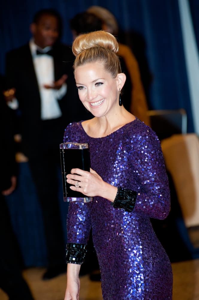 Kate Hudson attended the White House Correspondents Dinner on April 28, 2012, in Washington, D.C. She was quite elegant in her sequined dress and neat top knot bun hairstyle with a slight beehive finish.