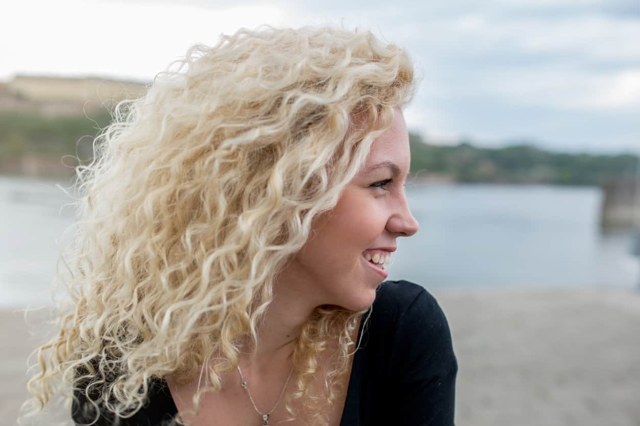 blond woman curly hair