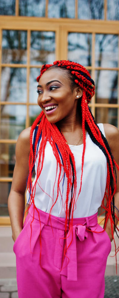 Woman with black and red fulani braids (long hair)