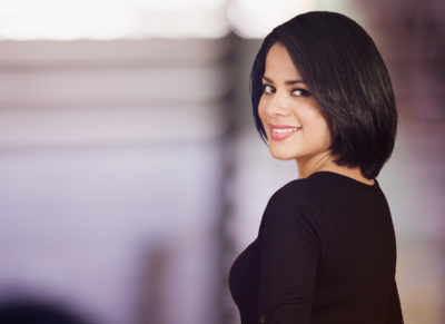 Woman with dark short straight hair
