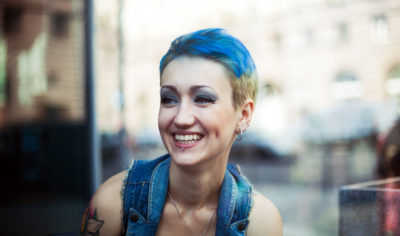 Woman with short blue hair