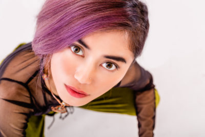 Woman with short purple hair
