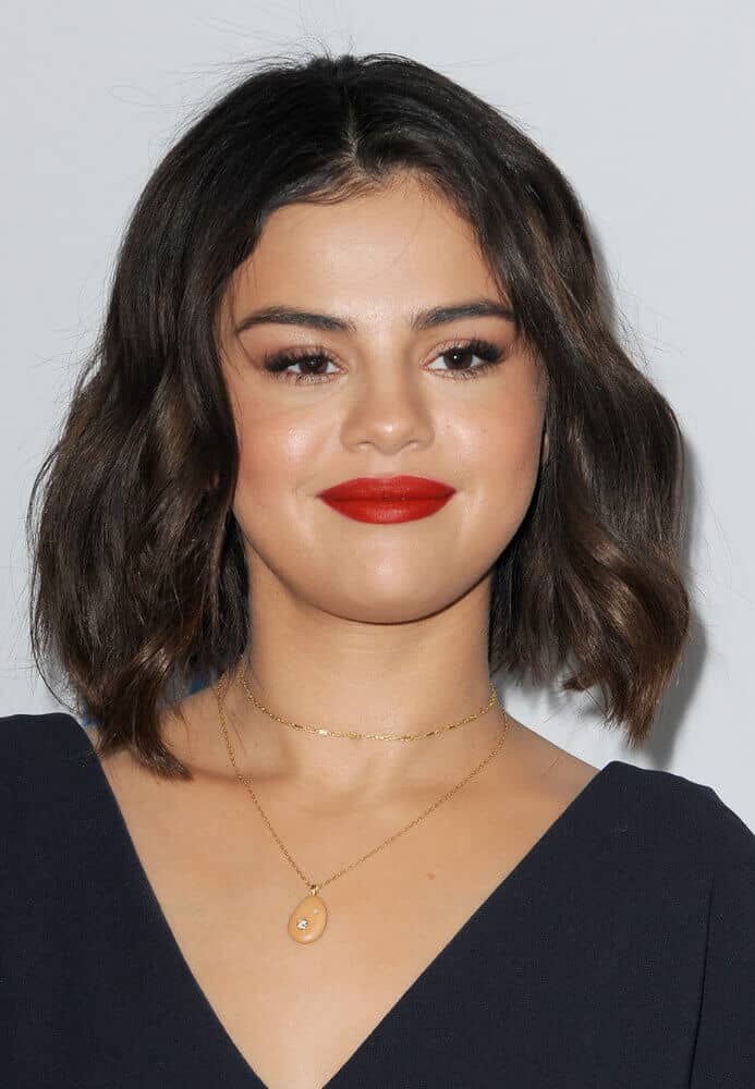 Selena Gomez has lifted roots for a little volume.