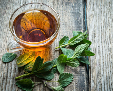 Cup of peppermint tea for hair rinse