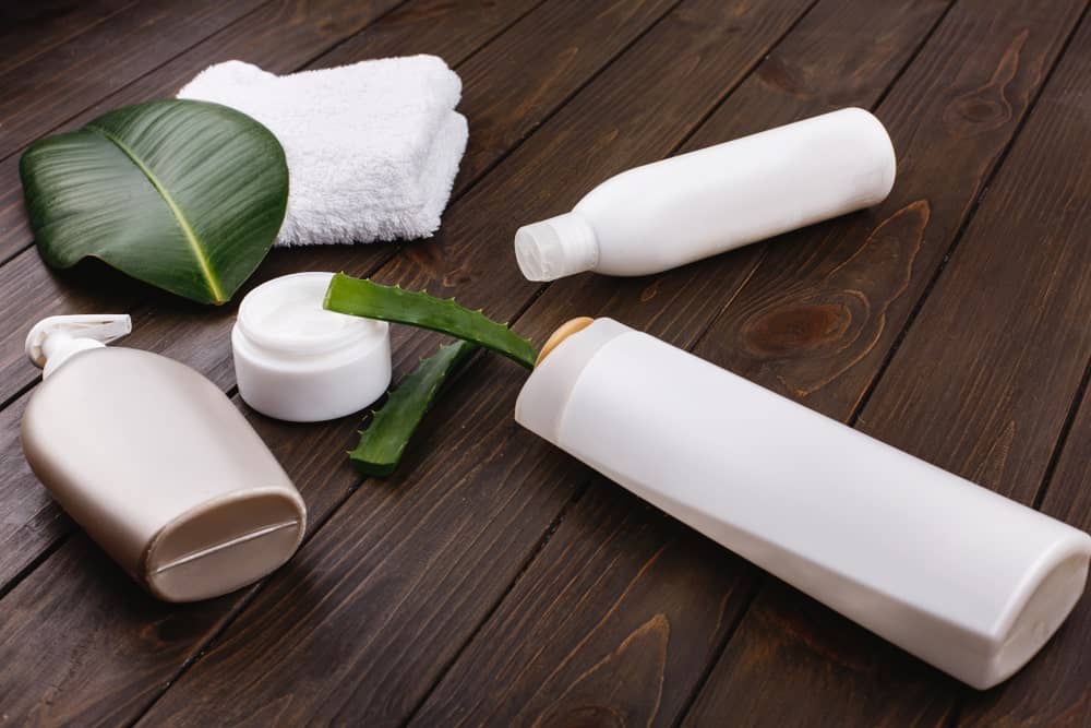 Shampoo for color-treated hair on a hardwood table.
