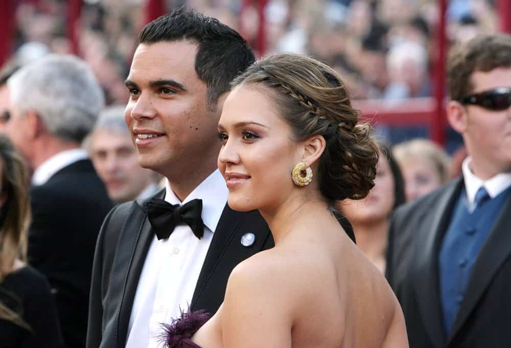 Jessica Alba has amazing low-key elegance that you can achieve. Part down the middle and make a simple crown braid to about 1 inch behind the ears. Wrap your hair into a loose, low bun and pull out a couple of pieces to braid and tuck back in.