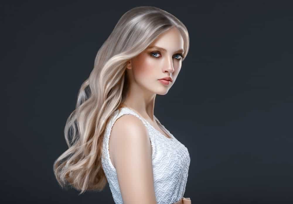 Since balayage comprises of multiple hues, one of the best ways to make the most of it is curl your hair. The multiple hues of blond and brunette shades and a curling effect will make your hair look fuller and more elegant.