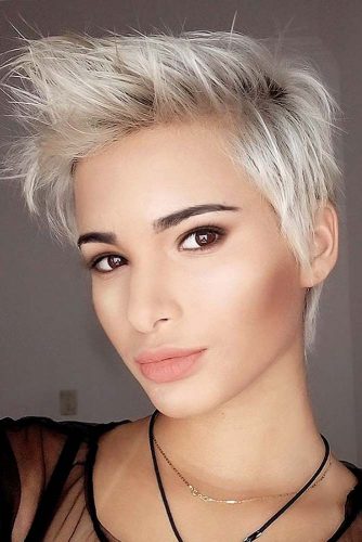 https://www.flickr.com/photos/141700006@N02/44594266611/ Want to get that punky, rockstar look. This pixie haircut is the perfect style for you with its pale silver strands and long, sharp frosted spikes in the front.
