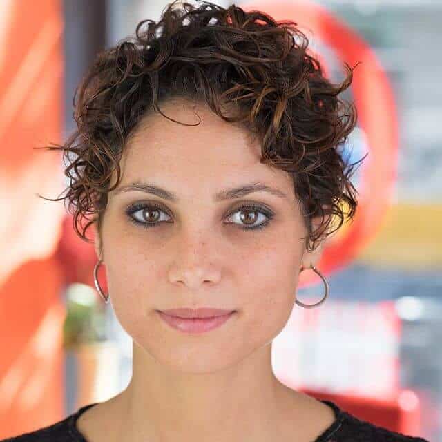https://www.flickr.com/photos/155844569@N02/44784308551/ You can achieve one of the most youthful looks with a pixie cut. Make sure your pixie cut is slightly longer and then style it in a mass of curls around your head.