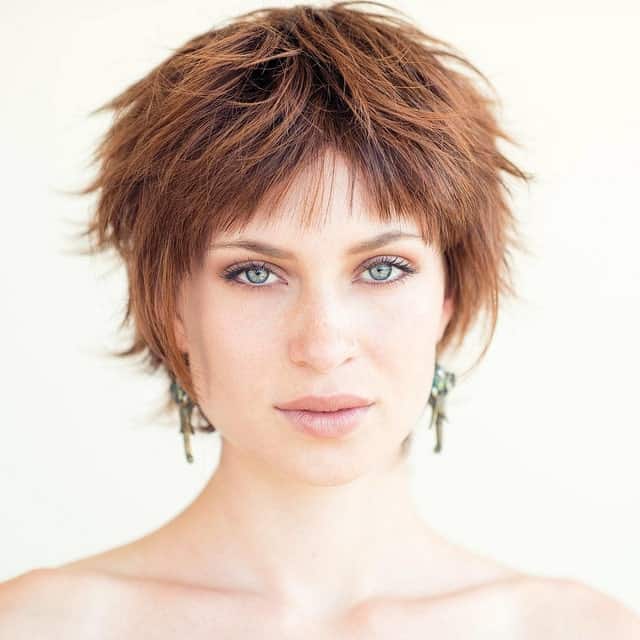 https://www.flickr.com/photos/155844569@N02/42539889605/in/photolist-66Rq8u-WLs3mQ-27P747v-24Botfz-C7sfzd This style of pixie has choppy, unequal-sized hair, giving the cut more definition and volume. The pixie haircut on this young woman is a feathered dream.