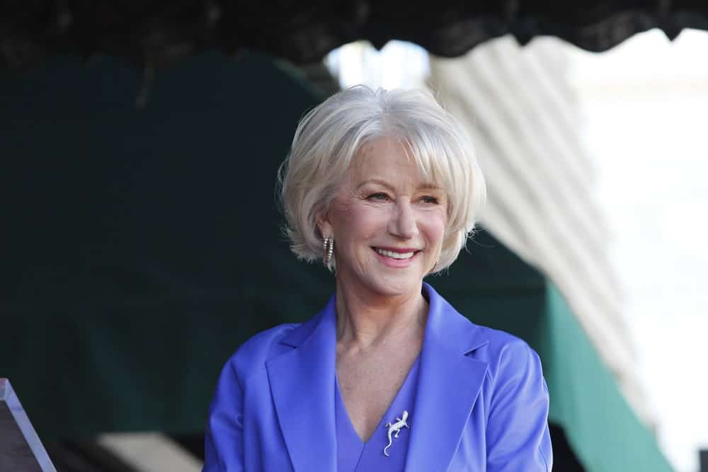 Helen Mirren is the perfect example of aging gracefully. The actress’s fashion sense has put women half her age to shame. Here, she is sporting a fluffy, feathery platinum blonde lob with angled bangs.