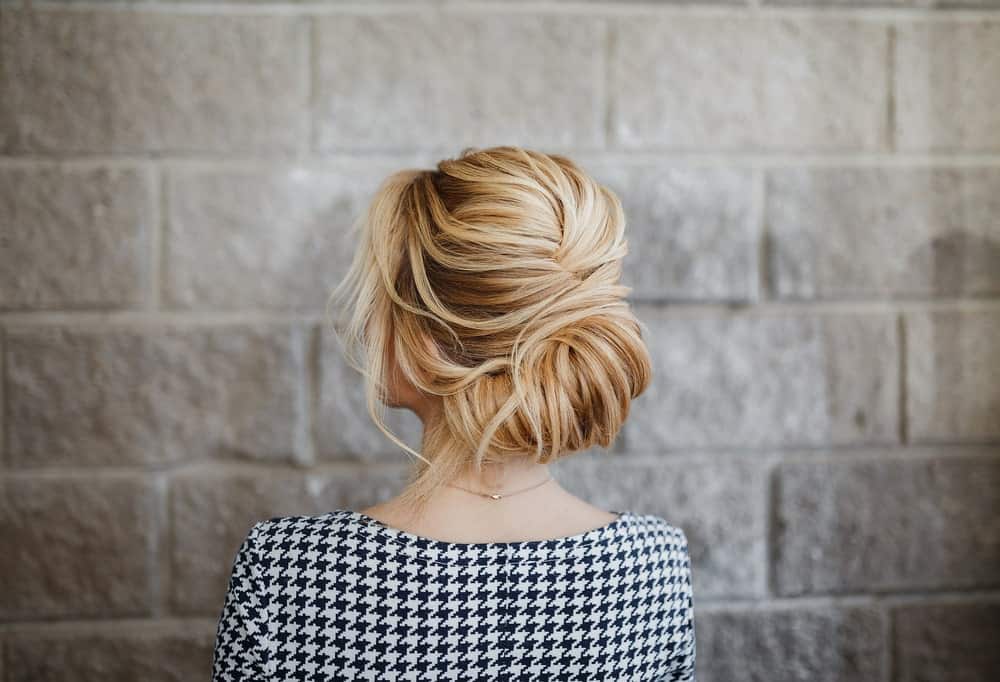 One of the most favored styles of updo, the French twist has not yet lost its appeal. What is so wonderful about it is that it has so many variants, from a regal sleek twist to a messy knot.