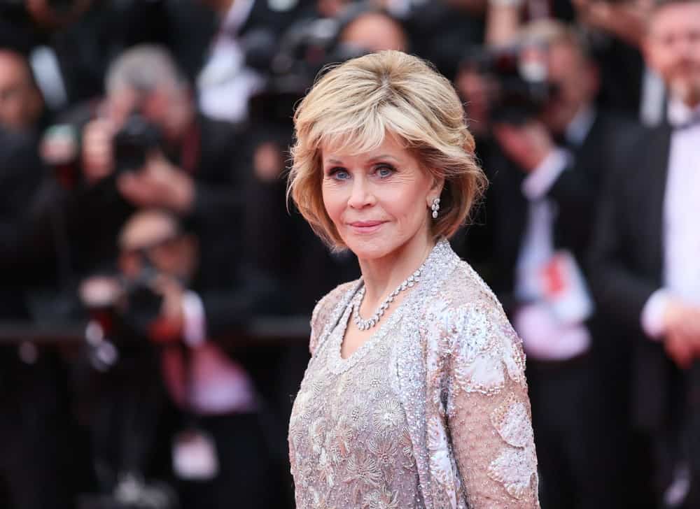 Jane Fonda has sported this super-cool vintage look since the 1960s. It still works for her. To give this look a bit of a modern update, go for a side part and sweep the hair gently to the side.