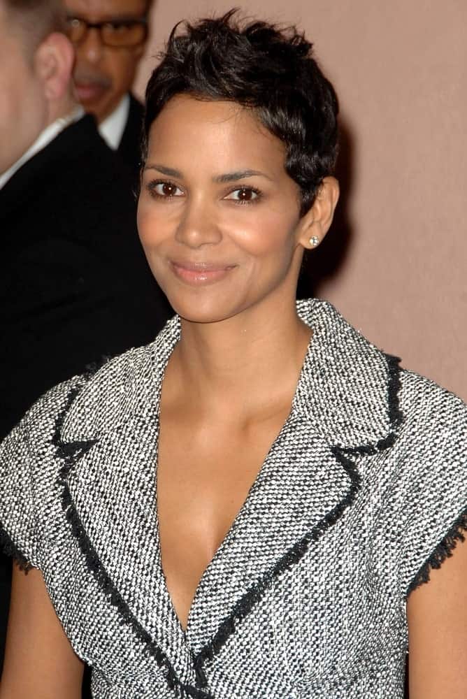 Gorgeous actress Halle Berry has been rocking her iconic pixie look since the 1990s. In this image, she styled the front of her hair with spikes, giving her a very edgy look.