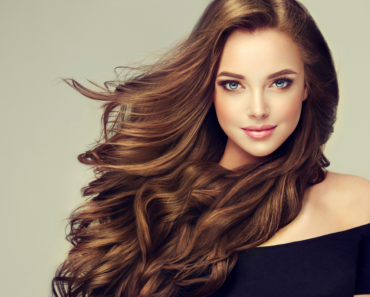 Woman with beautiful wavy brunette hair