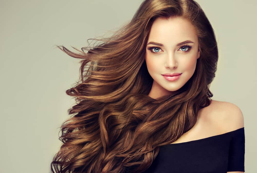 Woman with beautiful wavy brunette hair