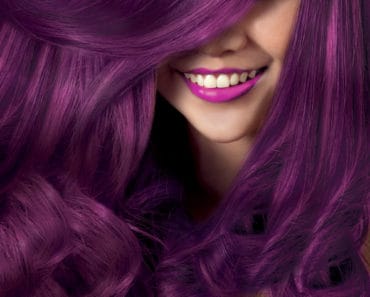 a woman flaunting her purple hair