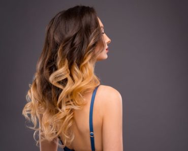 A beautiful woman with beautiful hair weaves on
