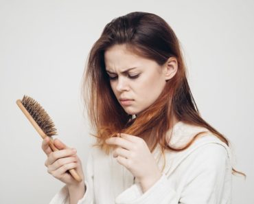 A Perplexed Girl with Hair Problems