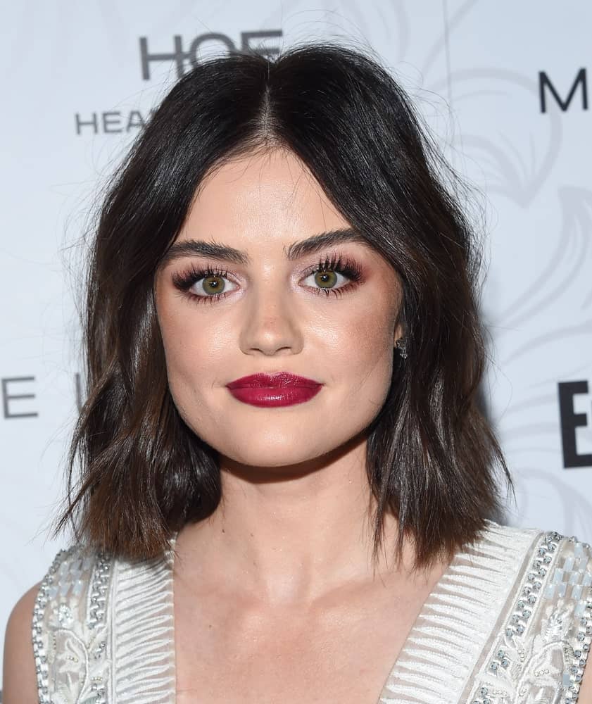 A bob till the shoulders is a great idea, especially with tousled, messy hair to give it an effortless look. The brunette hair looks amazing on Lucy Hale, all tousled and messy. 