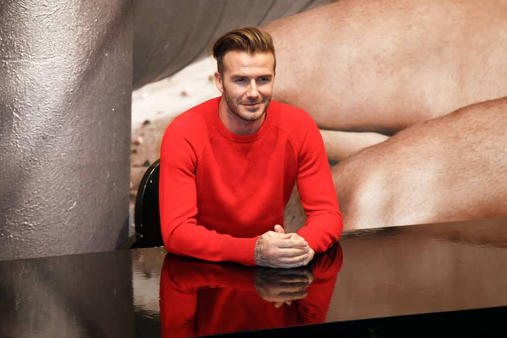 Before David Beckham showed up at Prince Harry’s and Meghan Markle’s wedding with a feathery crop and made the world swoon, the former Manchester United football player used to rock a slicked-back pompadour style. However, this look doesn’t come easy. To achieve the style, you need to blow-dry your hair, then add texture spray or mousse before a light pomade, and then fix it in place with some hairspray.That’s how many products and stages it requires.