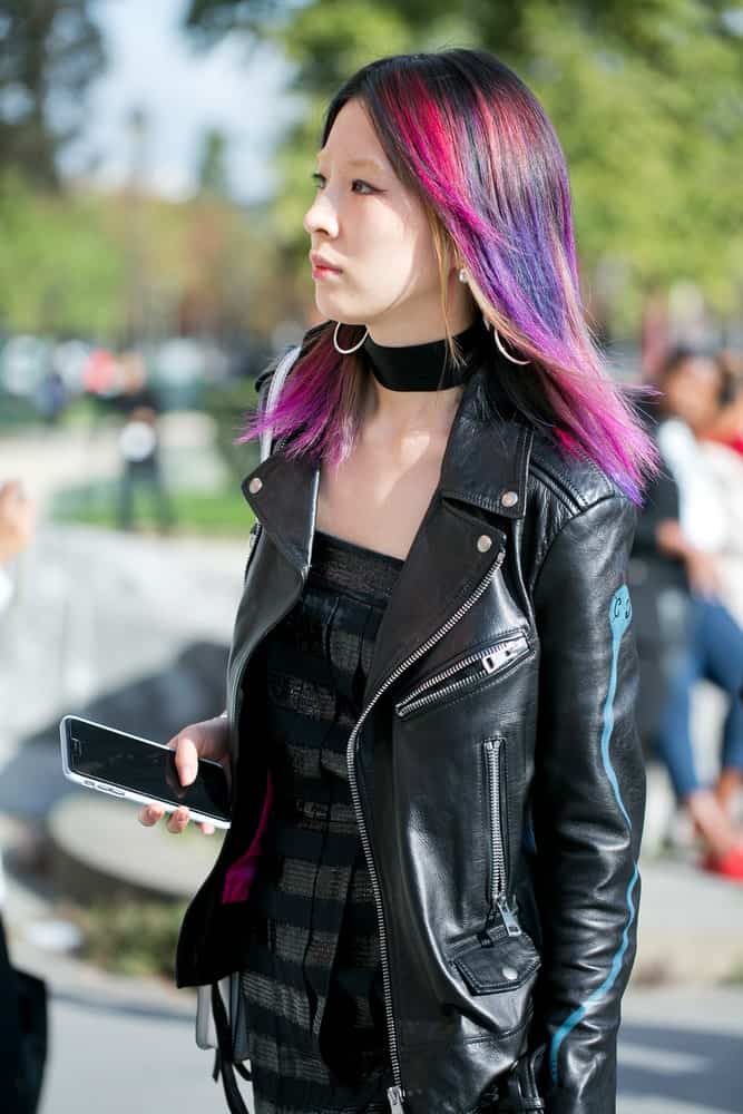 Model Irene Kim is a constant source of hair inspiration, both in Korea and the United States. Here, Kim has brightened up her dark locks with edgy neon hues of vivid purple, pink, red and blue. Paired with a leather jacket, her hair gives her a perfect edgy look.