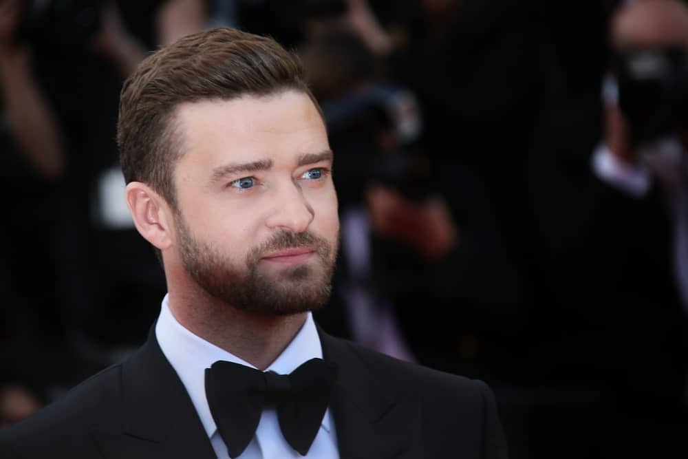 Just because you want a slicked back style, doesn’t mean you need to add a gallon of hair product to your hair. For those who don’t like the heavy feeling that can come with using too much styling pomade, Justin Timberlake’s minimal product look is the best. The singer’s barber styled his sides in a low-fade, and gave his full top hair a subtle slick with lots of brush-overs. This is one of the best red-carpet’s hair looks.