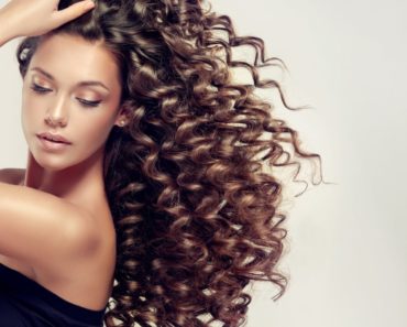 A Brunette Girl with Beautiful Permed Hair