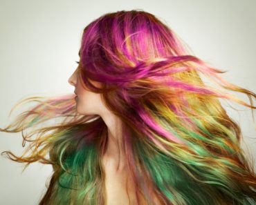 A young, beautiful girl with colored hair
