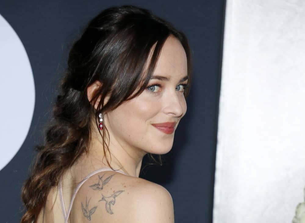 A side pose of Dakota Johnson