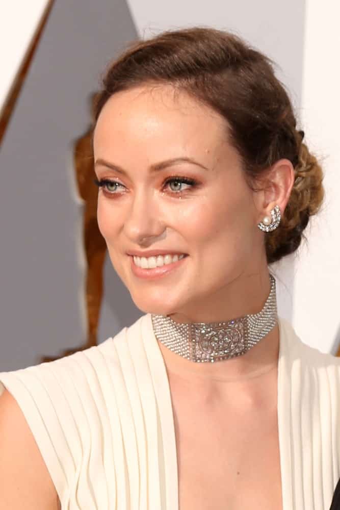 Olivia Wilde smiling at an awards function