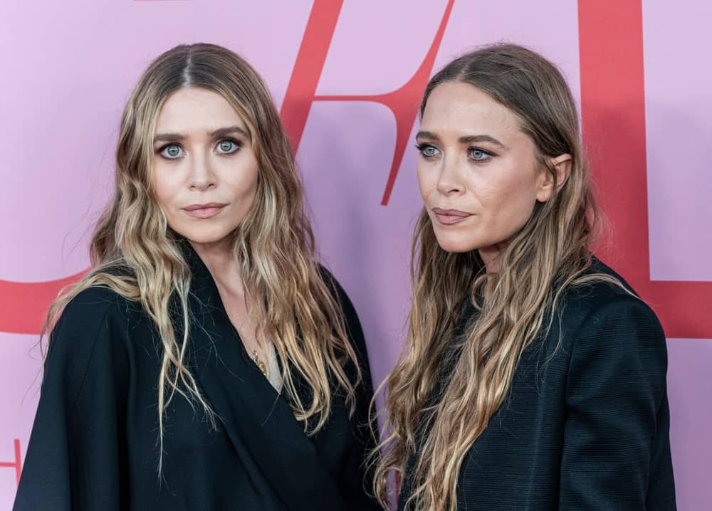 Mary-Kate Olsen and Ashley Olsen wearing dress by The Row attend 2019 CFDA Fashion Awards at Brooklyn Museum
