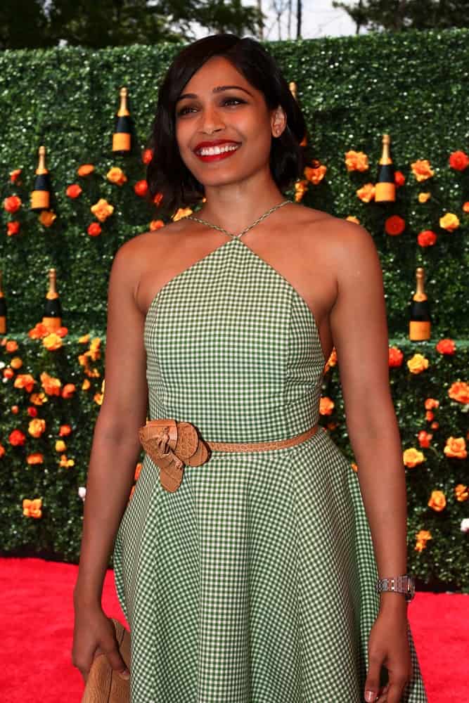 Actress Freida Pinto attended the 8th Annual Veuve Clicquot Polo Classic at Liberty State Park last May 30, 2015 in Jersey City with a fresh green summer dress that complements her short tousled bob hairstyle.