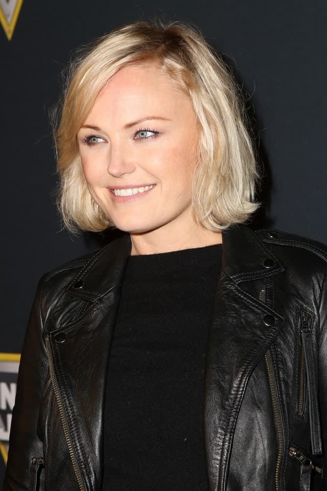 The talented actress was at the Monster Jam Celebrity Night last January 16, 2016 in Anaheim with a rocker chic ensemble and a casual tousled side-swept blond bob hairstyle.