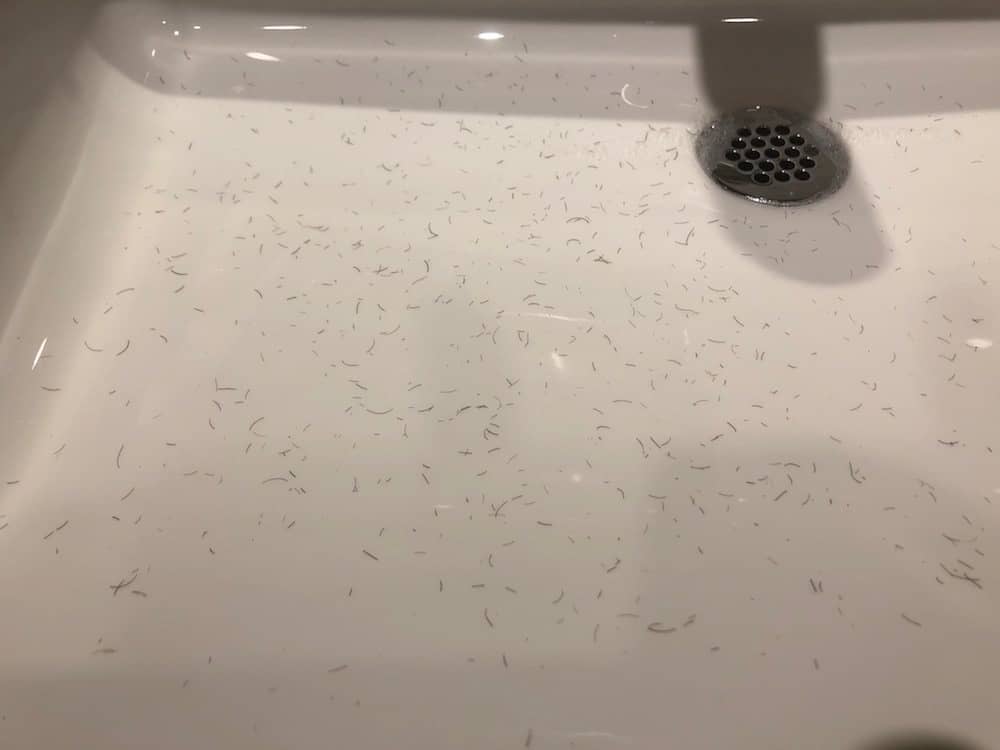 Sink with beard trimmings from the Remington Vacuum Beard Trimmer
