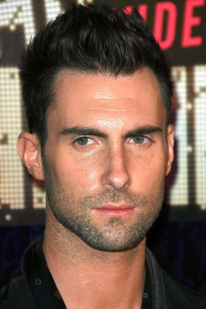 On September 9, 2007, Adam Levine of Maroon 5 was at the 2007 MTV Video Music Awards held at The Palms Hotel And Casino in Las Vegas, NV. He was handsome with his trimmed beard that worked well with his spiked fade hairstyle.