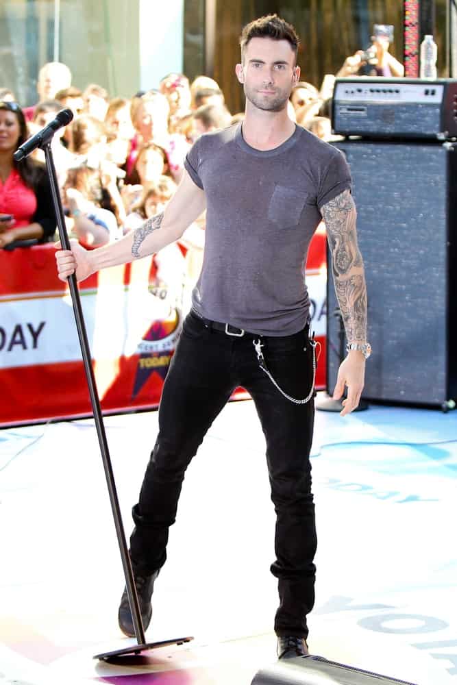Singer Adam Levine showed off his lean physique with a casual gray shirt and spiked fade hairstyle when he performed with Maroon 5 on the Toyota Today Show Concert Series on August 5, 2011 in New York City.
