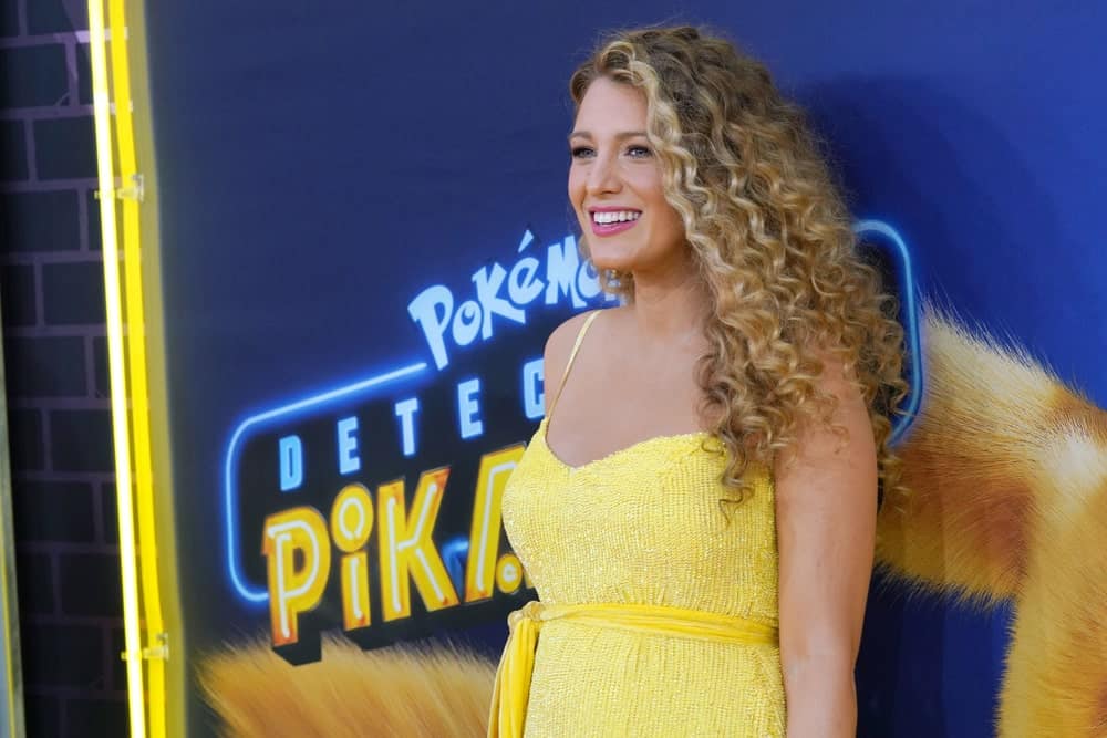 Blake Lively attended the premiere of “Pokemon Detective Pikachu” in Times Square last May 2, 2019. She wore an elegant and sexy canary yellow dress that suits her long curly highlighted hair quite well.