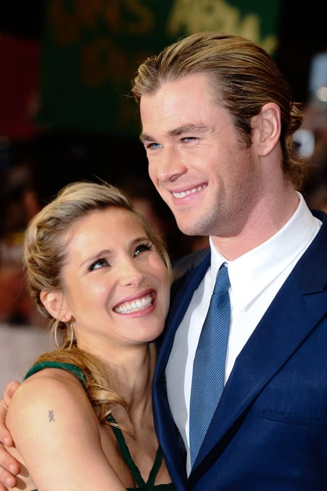Chris Hemsworth, alongside Elsa Pataky during the "Avengers Assemble" premiere on April 19, 2012. Chris was seen with a ponytail hairstyle.