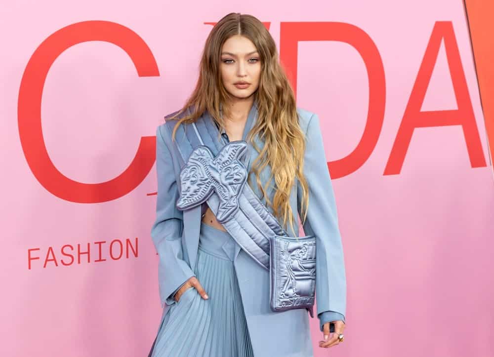 On June 03, 2019, Gigi Hadid attended the 2019 CFDA Fashion Awards at Brooklyn Museum in New York. She wore a fashionable light blue outfit with her loose and wavy balayage hairstyle.