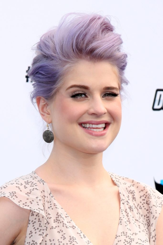 Kelly Osbourne looking stunning with her well-fixed purple hair. The photo was taken at 2012 Do Something Awards at Barker Hangar in Santa Monica, California. Photo taken on 19th of August.