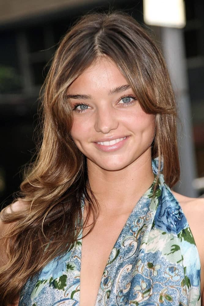 Australian model Miranda Kerr exhibited a charming look with her tousled brown tresses incorporated with long curtain bangs. She completed it with a floral halter dress that was worn during the RESCUE DAWN Premiere on June 25, 2007.