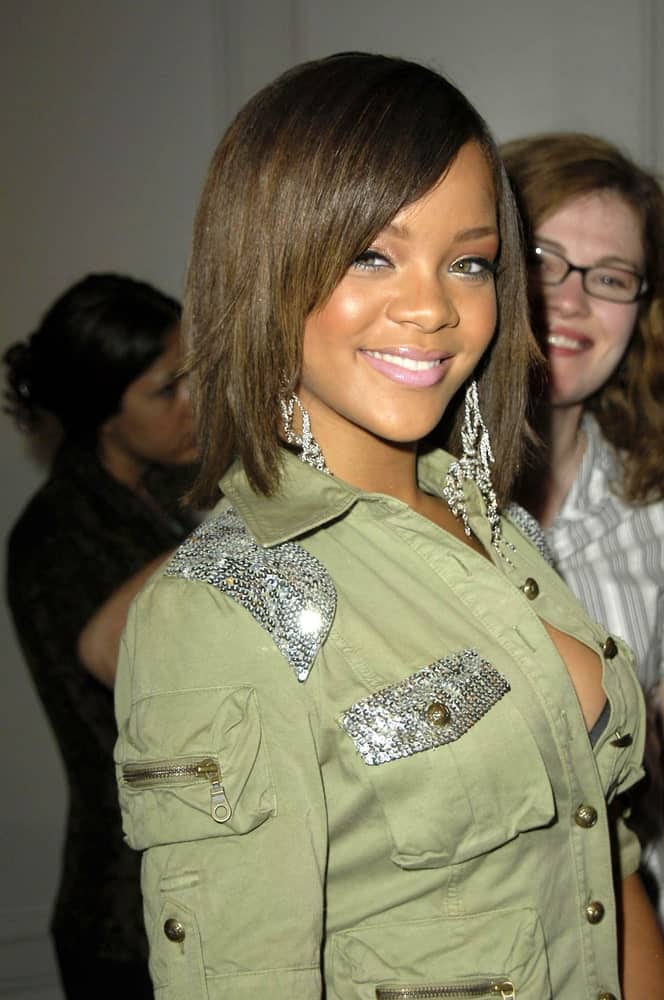 Rihanna wore an edgy and casual military jacket with her short bob hairstyle incorporated with long side-swept bangs at the press conference for the 33rd Annual AMA American Music Awards Nominations in Beverly Hills Hotel, Los Angeles, CA on September 20, 2005.