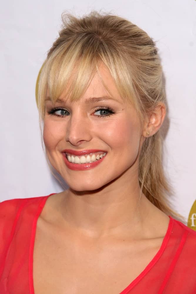 Kristen Bell incorporates her messy high ponytail with bangs at the 5th Annual Friends of El Faro Benefit to raise funds for the children of Tijuana Casa Hogar Sion Orphanage on August 7, 2008.