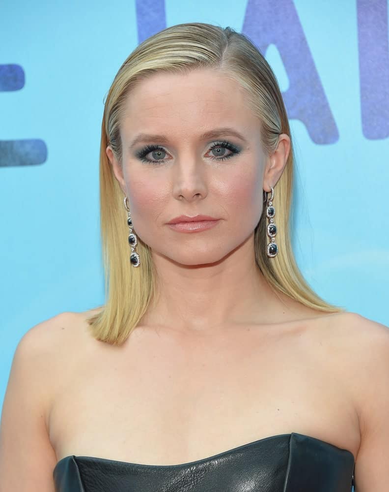 Kristen Bell exhibited a sultry look showcasing her slick side-parted hair and a black leather dress at the ‘Like Father’ Los Angeles Premiere on July 31, 2018, in Hollywood, CA